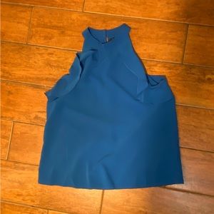 High neck blouse with frills.